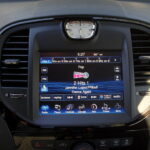Chrysler radio with SiriusXM showing