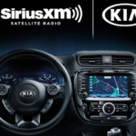 dashboard of KIA and SiriusXM and KIA logos